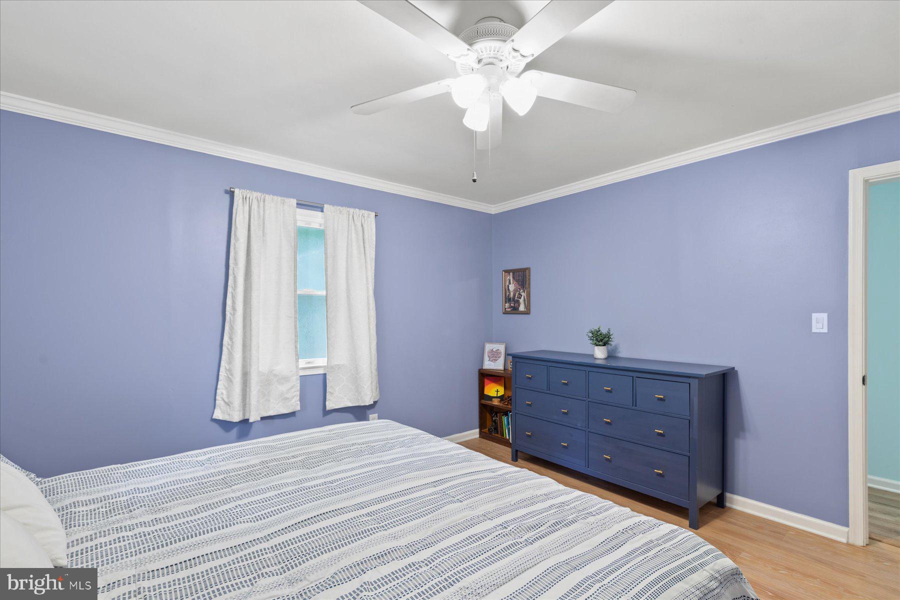 4 Poacher Berlin, MD 21811 - Photo 21 of 45 a bedroom with a bed and a dresser
