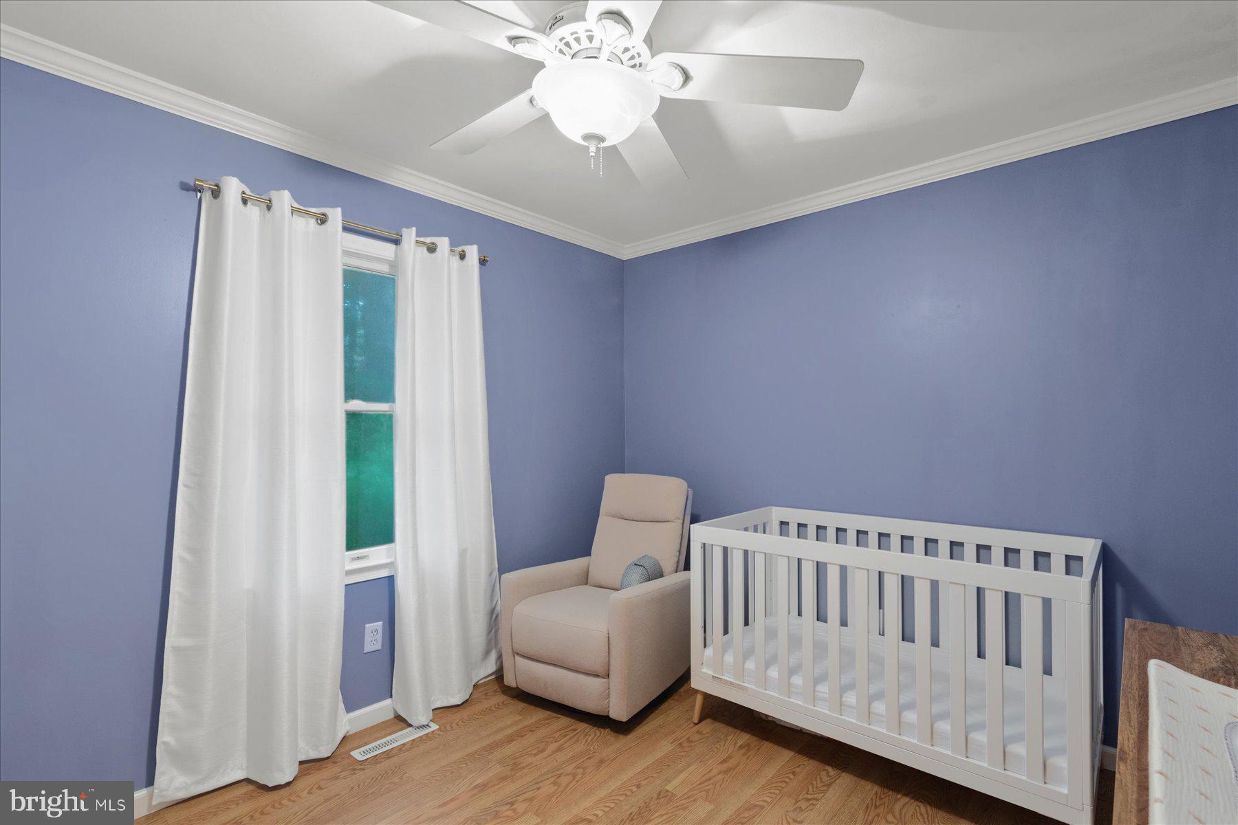 4 Poacher Berlin, MD 21811 - Photo 25 of 45 a bedroom with furniture and a window