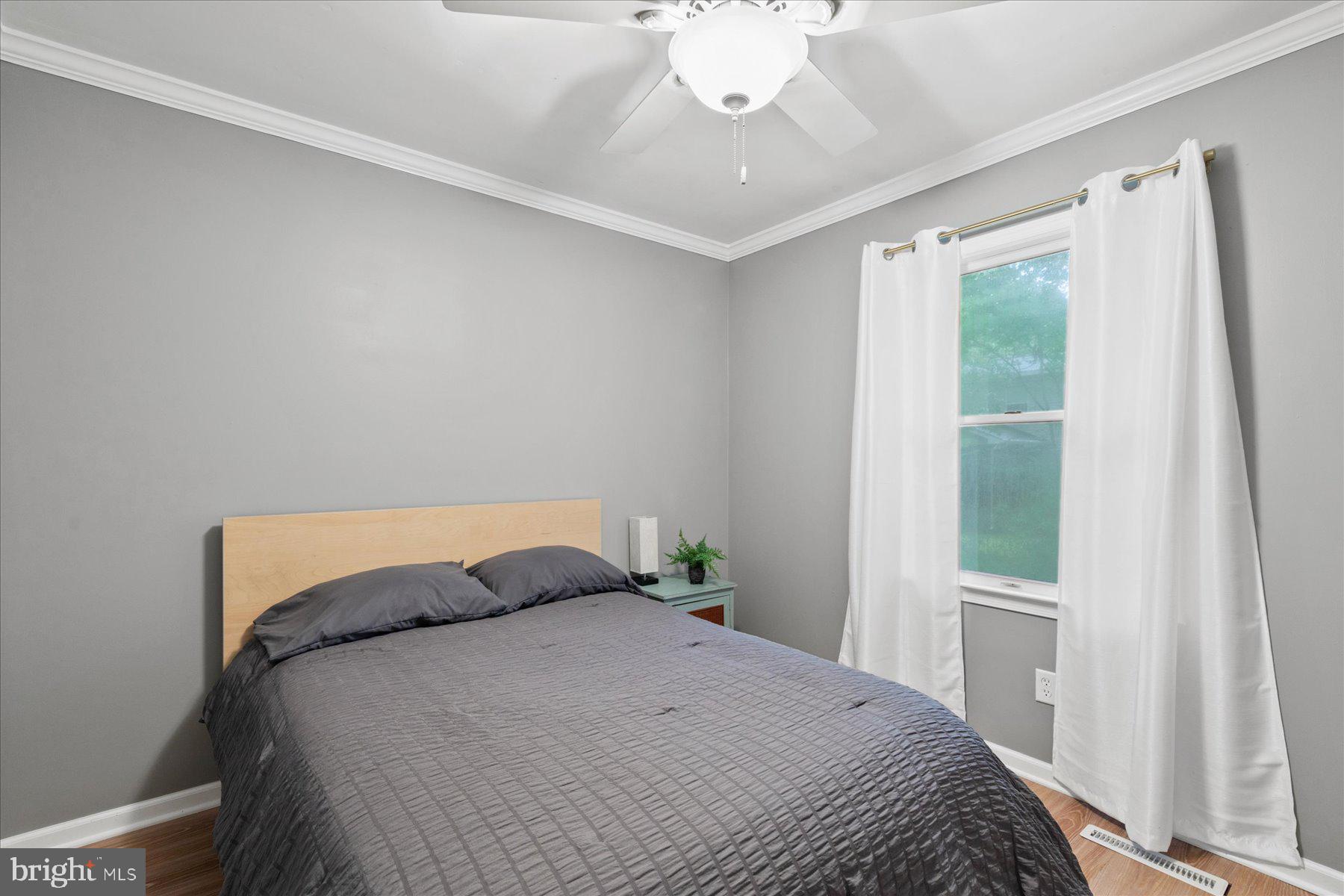 4 Poacher Berlin, MD 21811 - Photo 29 of 45 a bedroom with a bed and a window