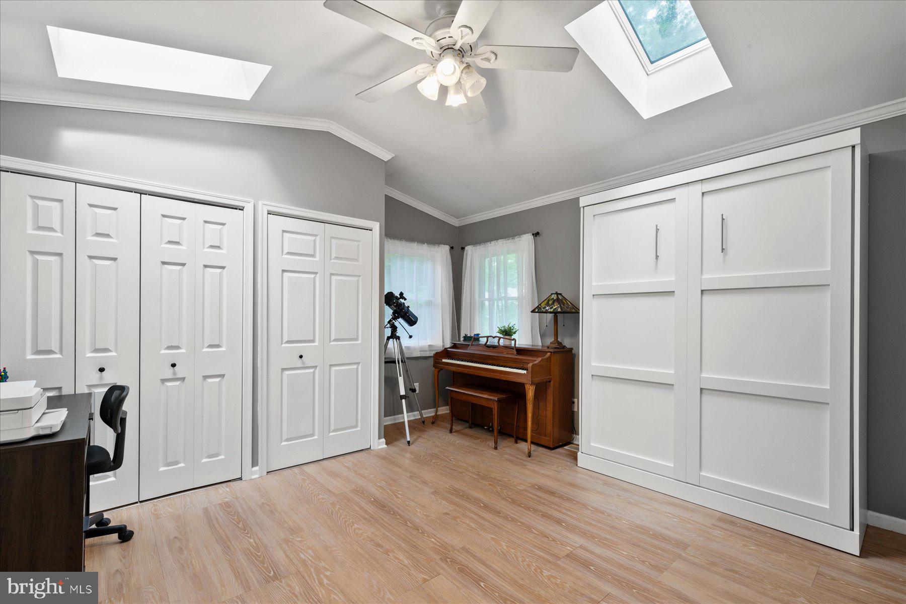 4 Poacher Berlin, MD 21811 - Photo 33 of 45 a livingroom with furniture a ceiling fan and wooden floor