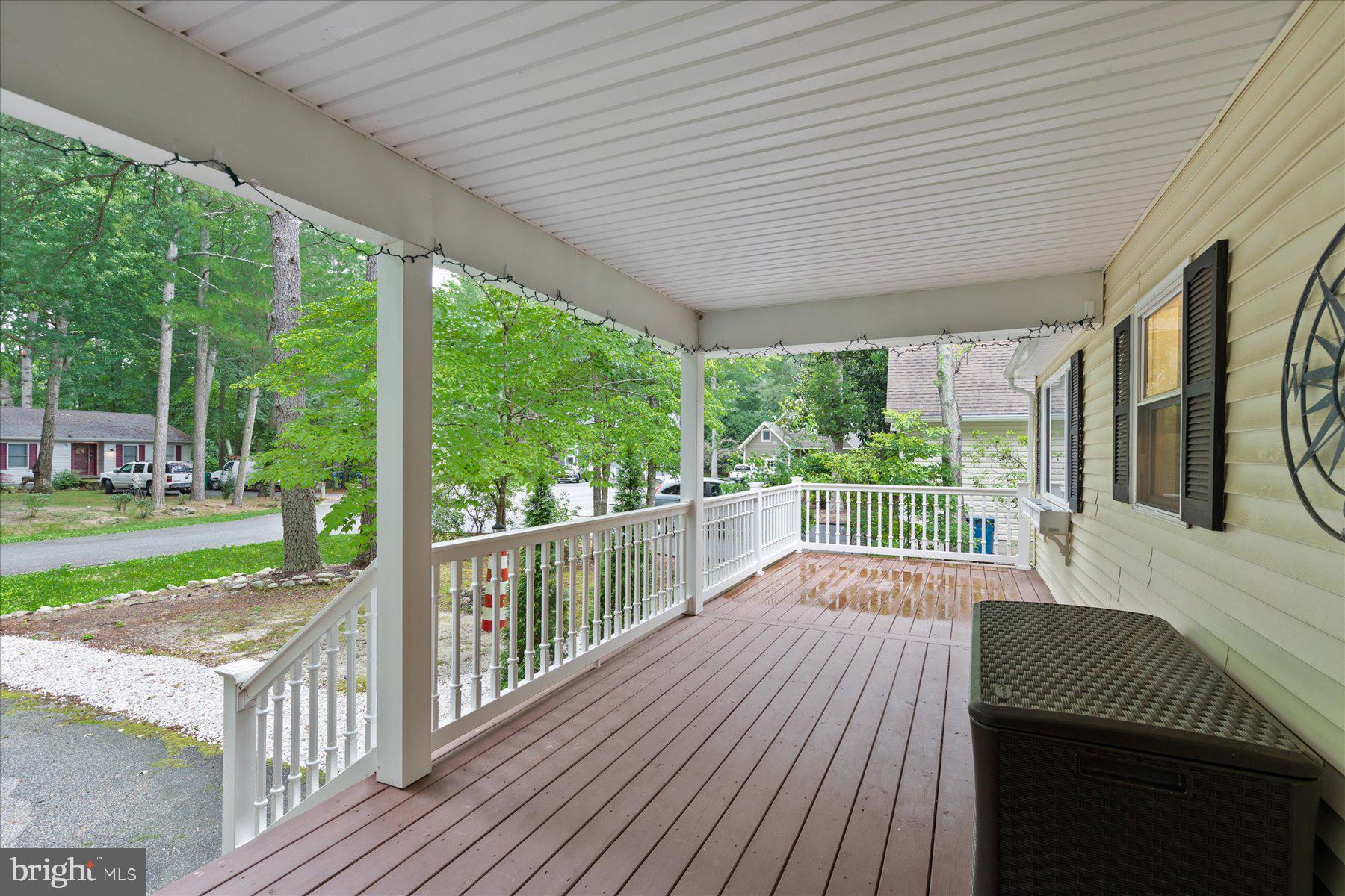 4 Poacher Berlin, MD 21811 - Photo 5 of 45 a view of a patio with wooden floor