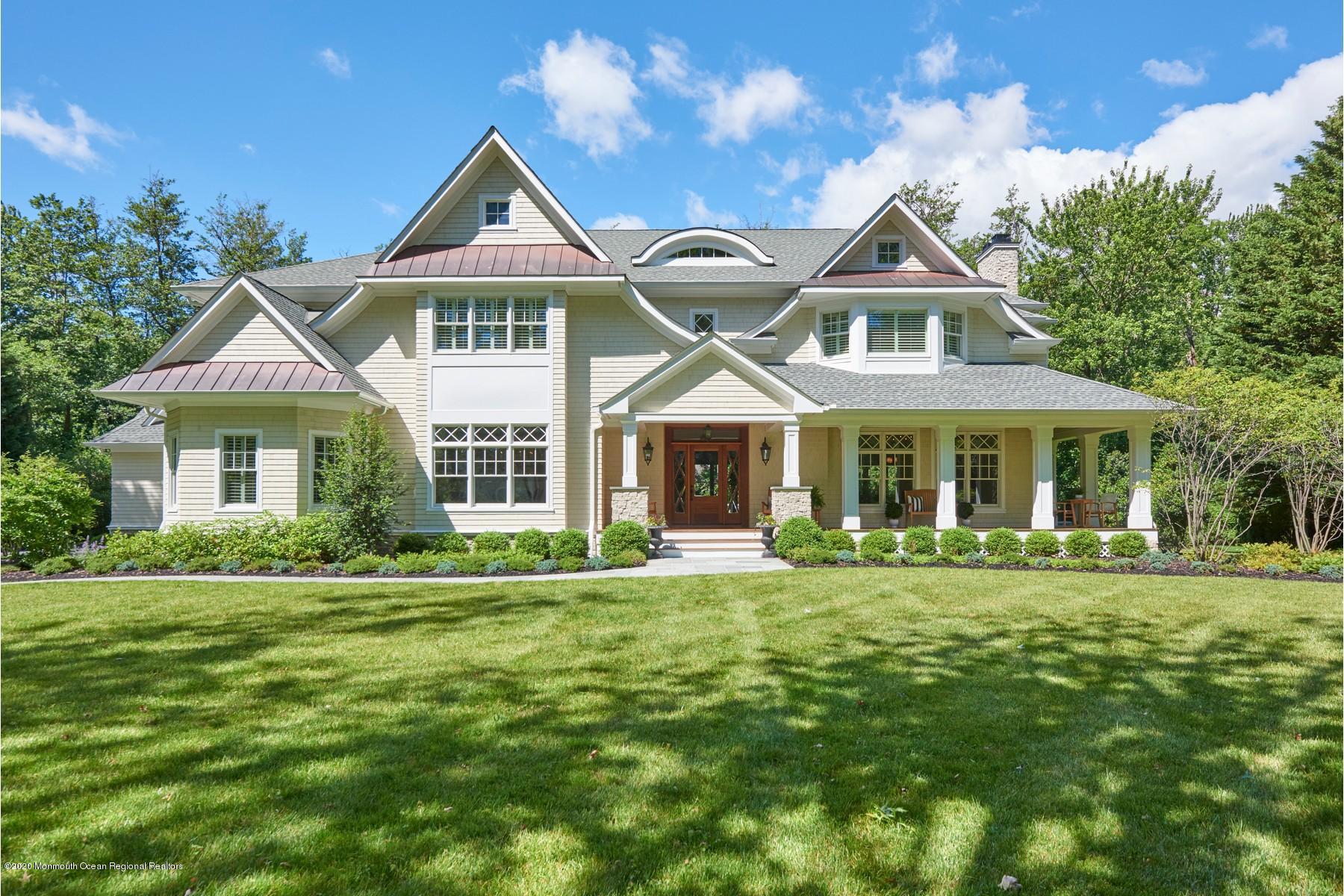 8 Heathcliff Road Rumson, NJ 07760 - Photo 1 of 46 a front view of a house with a yard