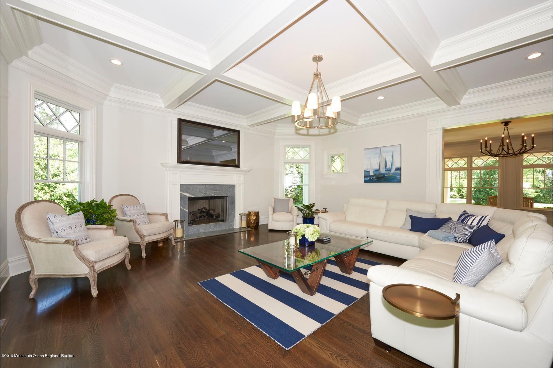 8 Heathcliff Road Rumson, NJ 07760 - Photo 11 of 46 a living room with furniture fireplace and window