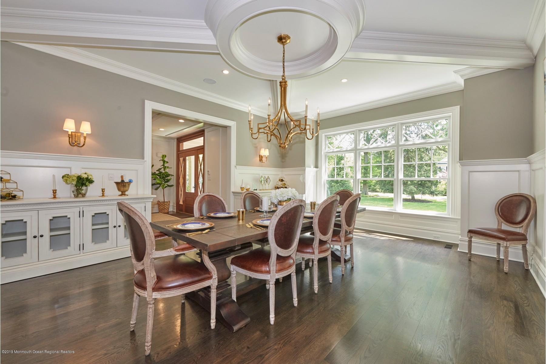 8 Heathcliff Road Rumson, NJ 07760 - Photo 15 of 46 a view of a dining room with furniture window and wooden floor