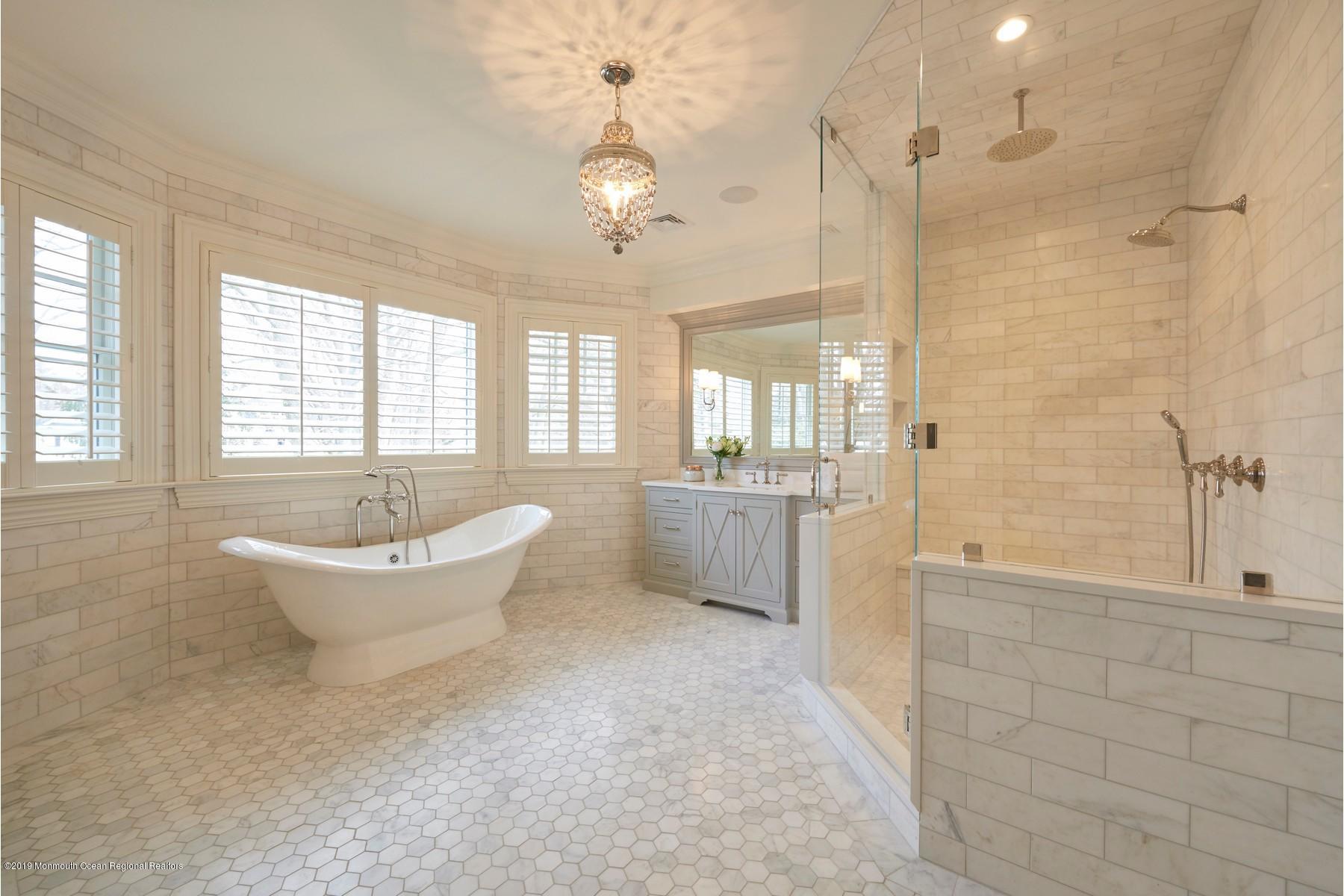 8 Heathcliff Road Rumson, NJ 07760 - Photo 24 of 46 a bathroom with a bathtub a toilet and a shower