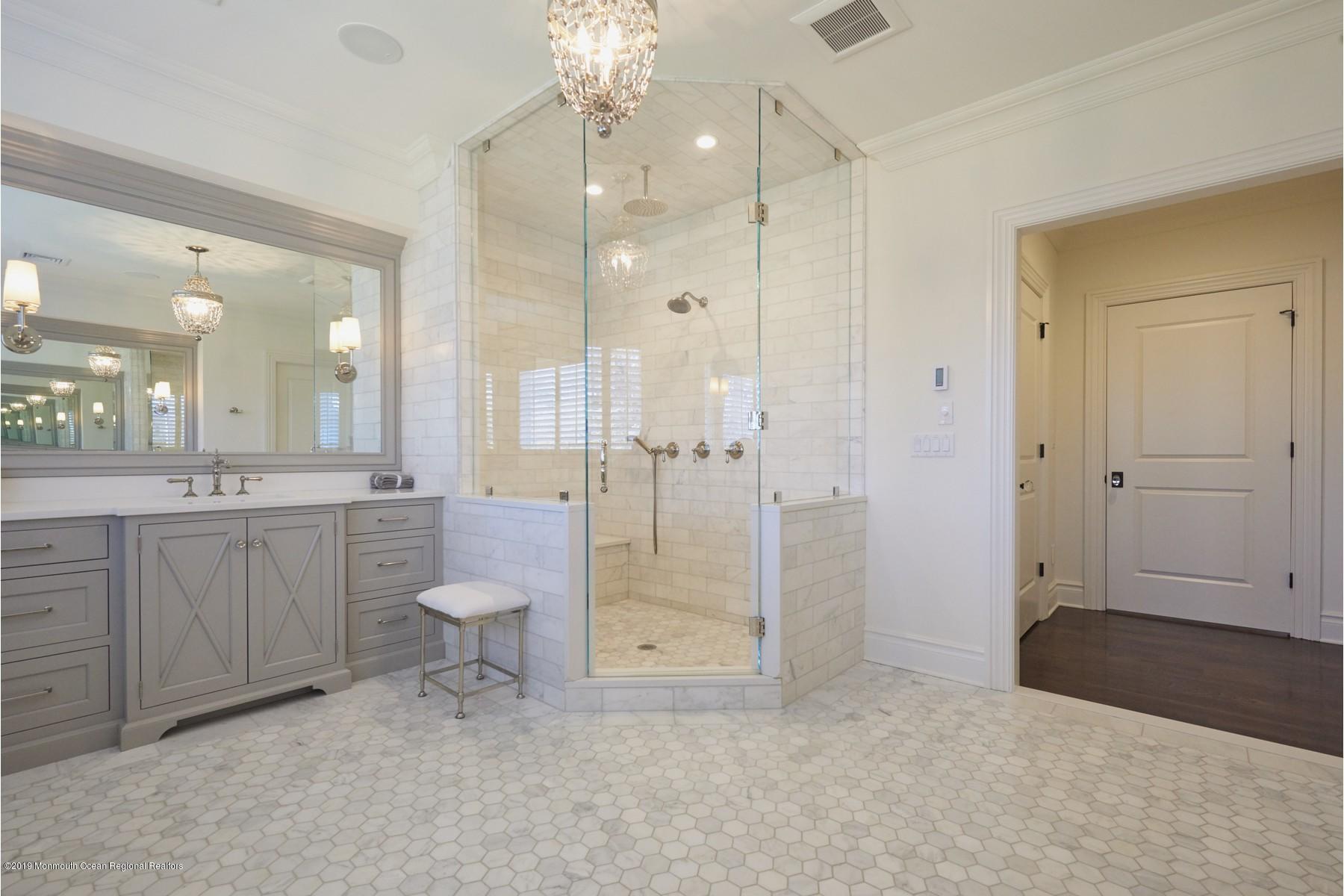 8 Heathcliff Road Rumson, NJ 07760 - Photo 25 of 46 a bathroom with a granite countertop sink a toilet and shower