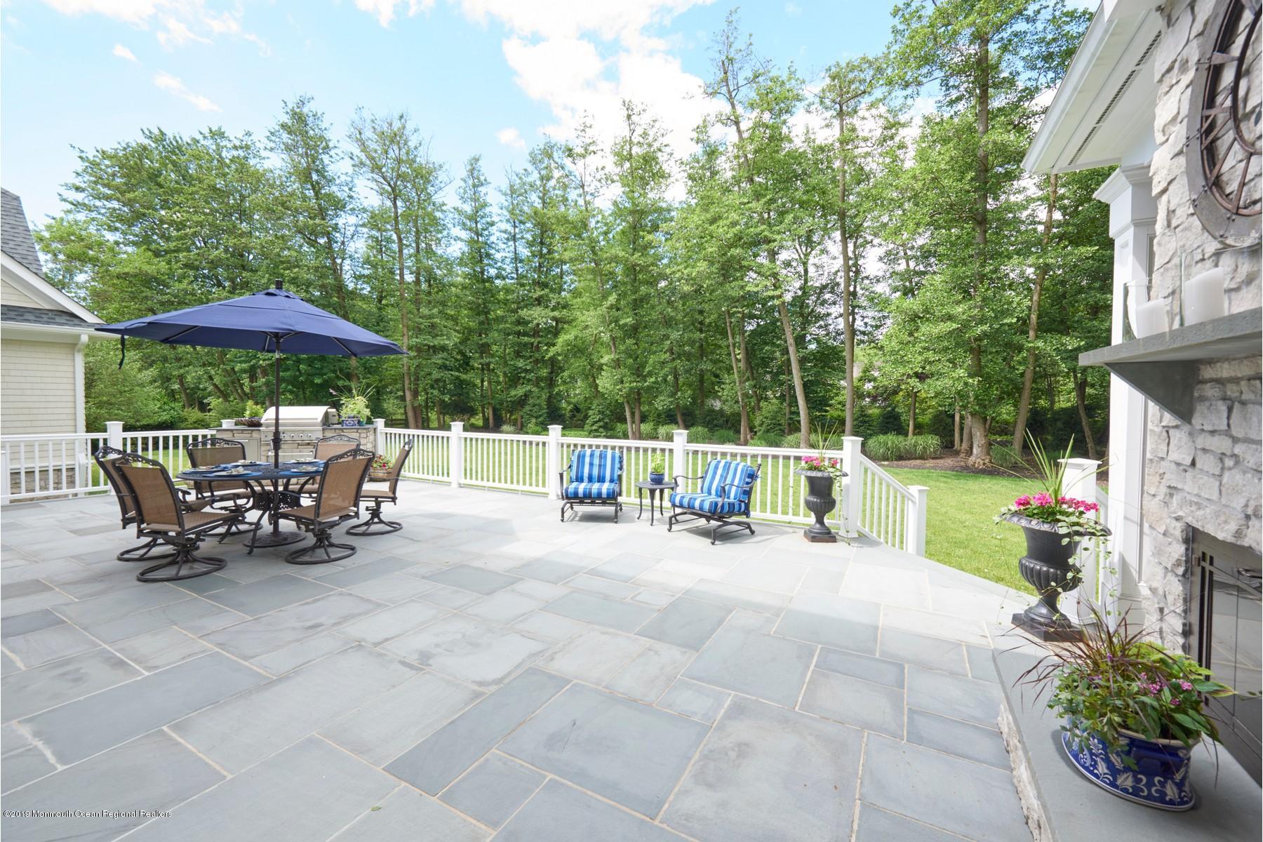 8 Heathcliff Road Rumson, NJ 07760 - Photo 3 of 46 a view of backyard with sitting area