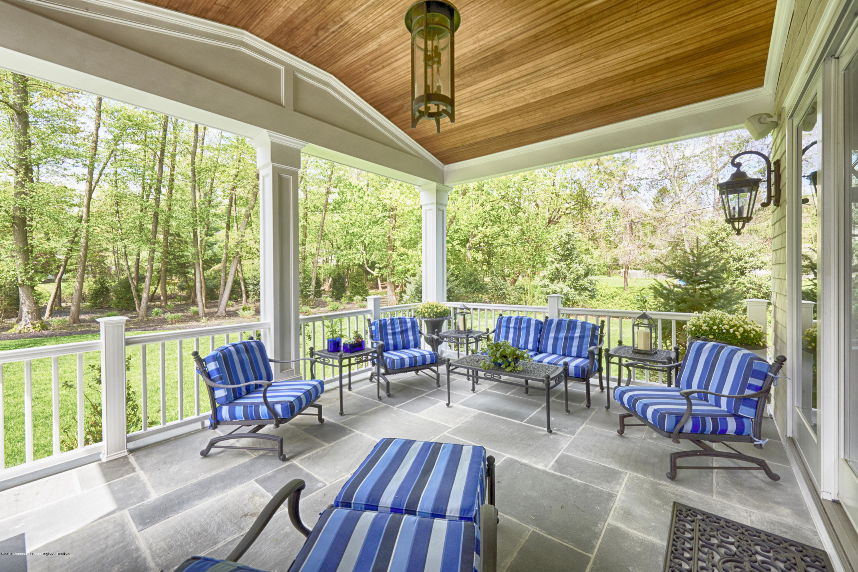 8 Heathcliff Road Rumson, NJ 07760 - Photo 41 of 46 a outdoor living space with furniture and garden view