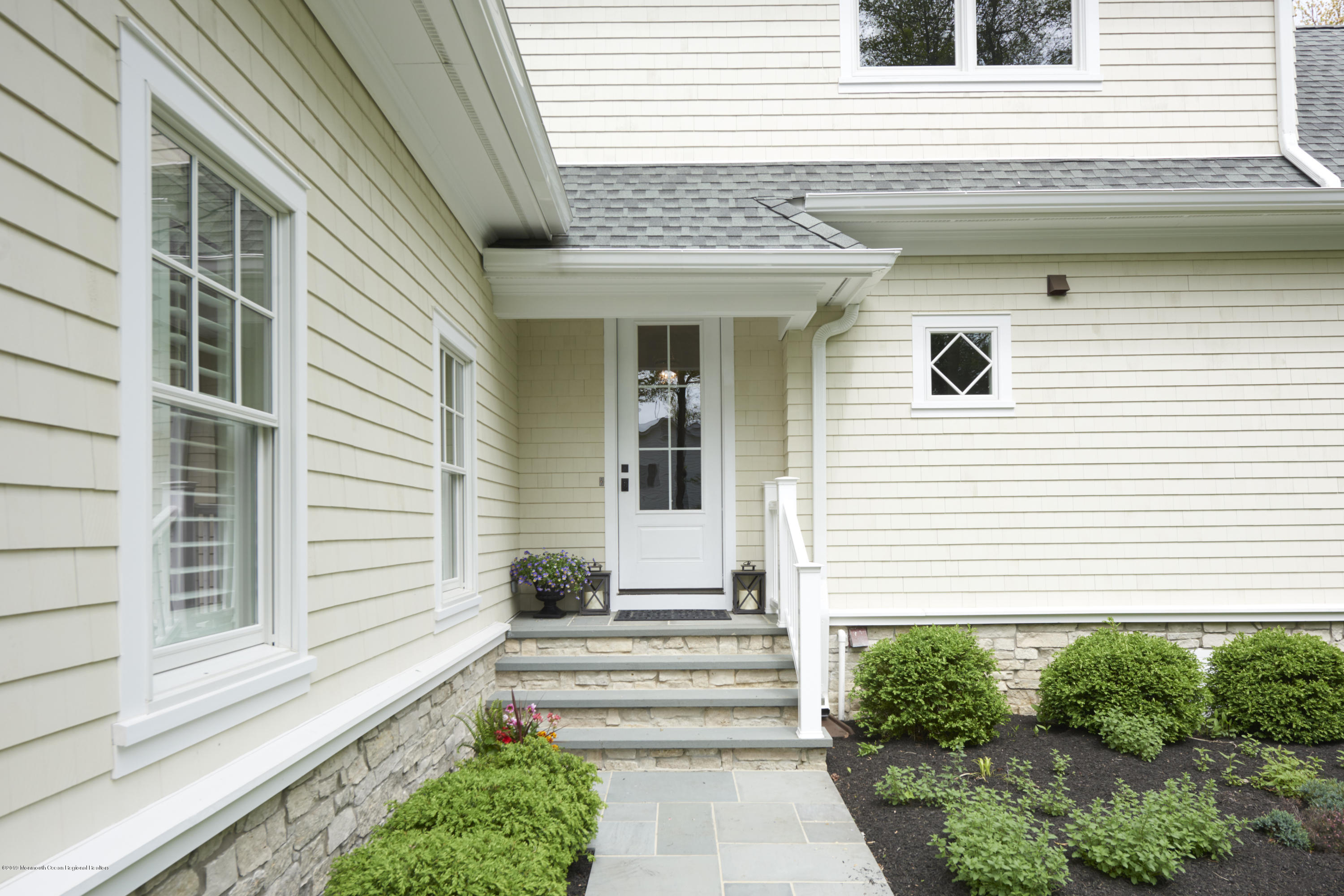8 Heathcliff Road Rumson, NJ 07760 - Photo 43 of 46 a view of a house with potted plants