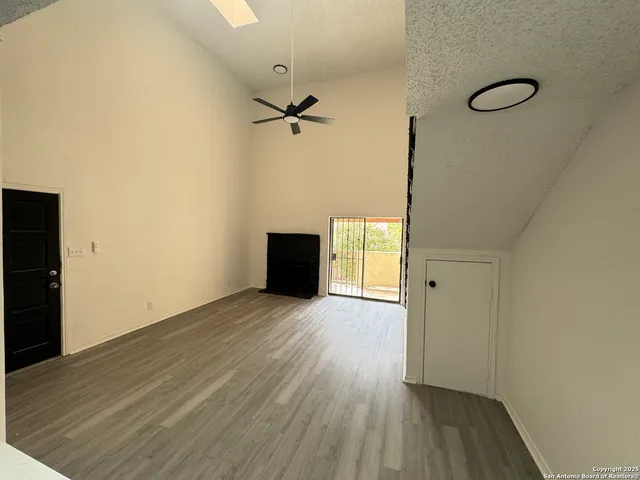 a kitchen with stainless steel appliances a refrigerator and a stove