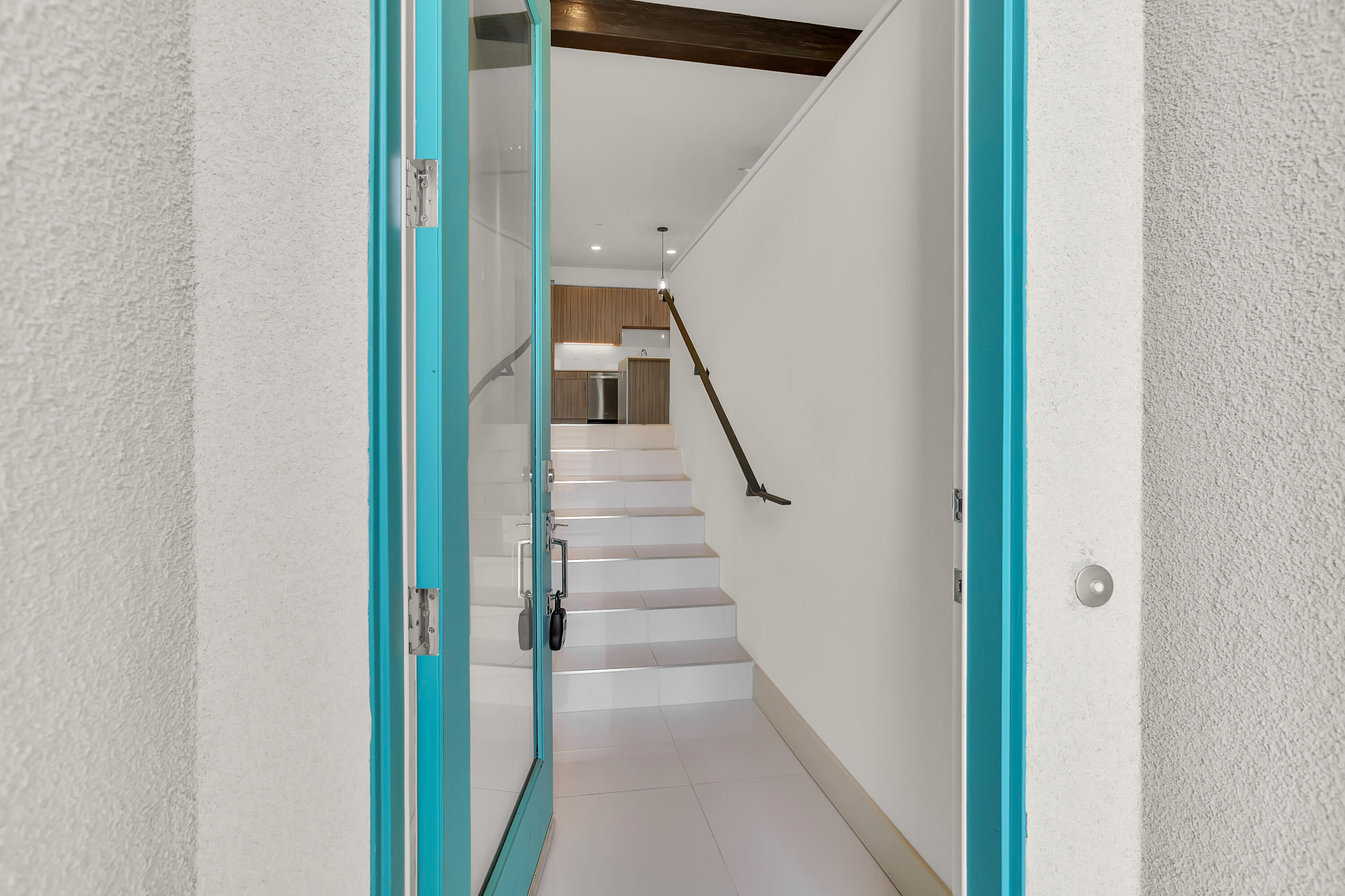 191 The Riv Palm Springs, CA 92262 - Photo 4 of 33 a view of a hallway with staircase