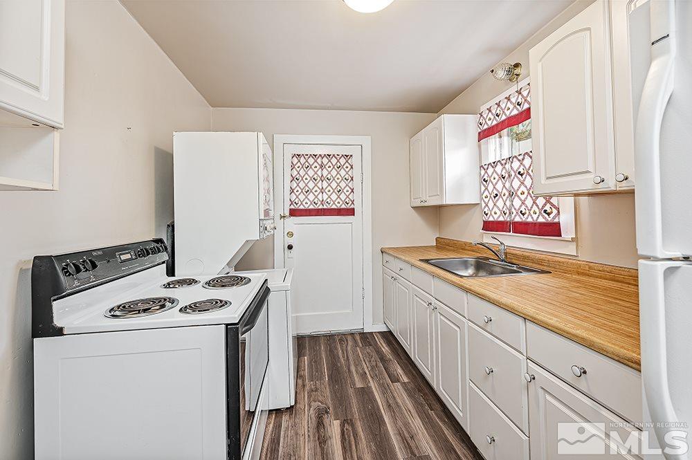 744 Roberts Street Reno, NV 89502 - Photo 15 of 23 a kitchen with a stove and a sink