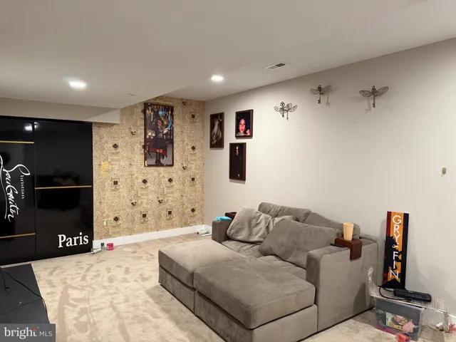 a hallway with sliding door and windows