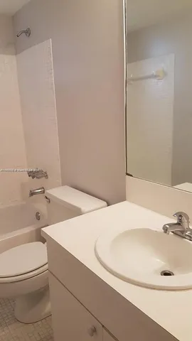 a bathroom with a sink and a bathtub