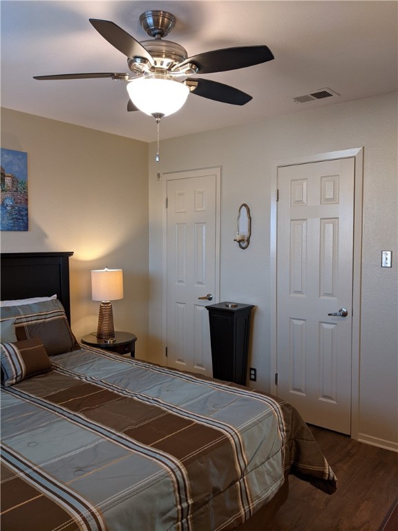 3000 Guadalupe Street, Unit 304 Austin, TX 78705 - Photo 15 of 24 a bedroom with a bed and a lamp