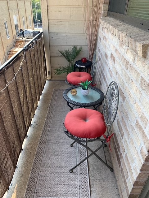 3000 Guadalupe Street, Unit 304 Austin, TX 78705 - Photo 23 of 24 a view of a chairs and table in a backyard