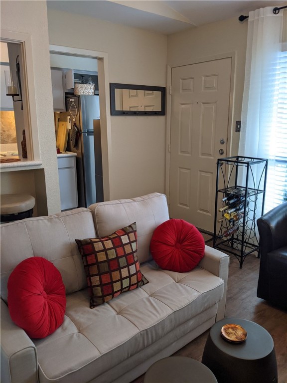 3000 Guadalupe Street, Unit 304 Austin, TX 78705 - Photo 5 of 24 a living room with furniture and a wooden floor