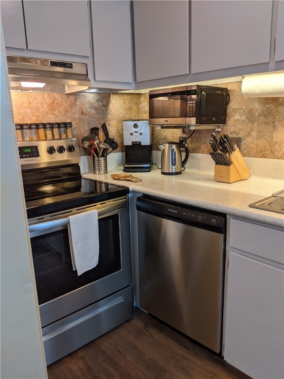 3000 Guadalupe Street, Unit 304 Austin, TX 78705 - Photo 10 of 24 a kitchen with appliances cabinets and a window