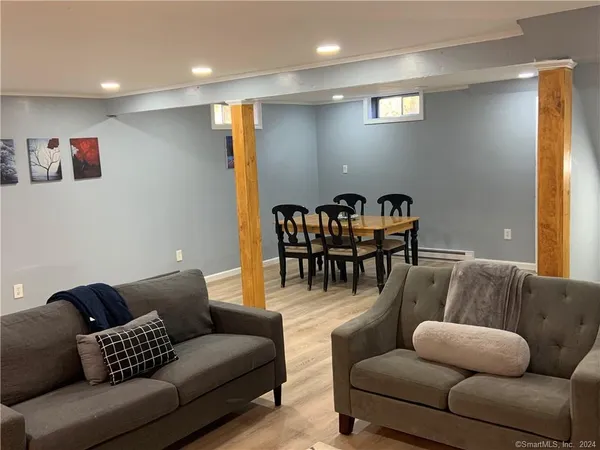 a view of workspace with a couch