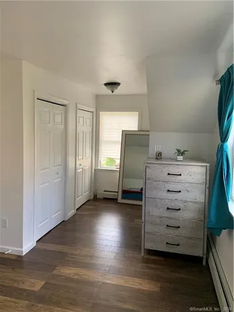 a view of a bedroom with a closet