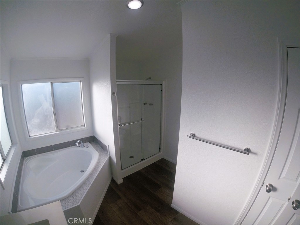 14058 Monte Vista Road Phelan, CA 92371 - Photo 12 of 17 a bathroom with a bathtub and a sink