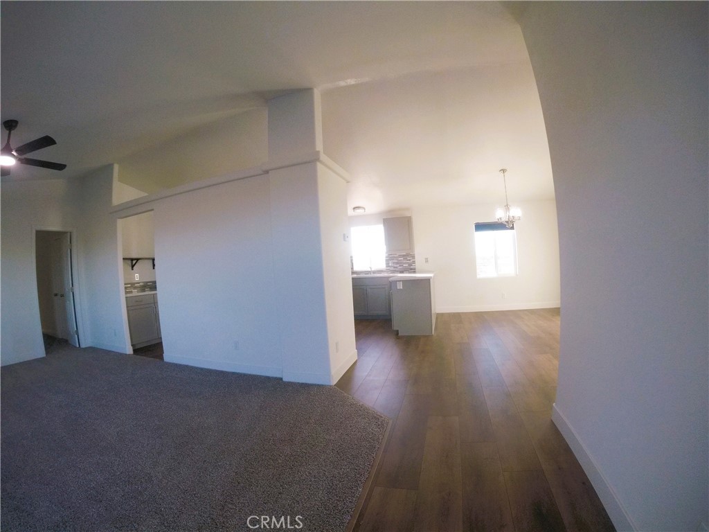 14058 Monte Vista Road Phelan, CA 92371 - Photo 2 of 17 a view of a livingroom with a sink