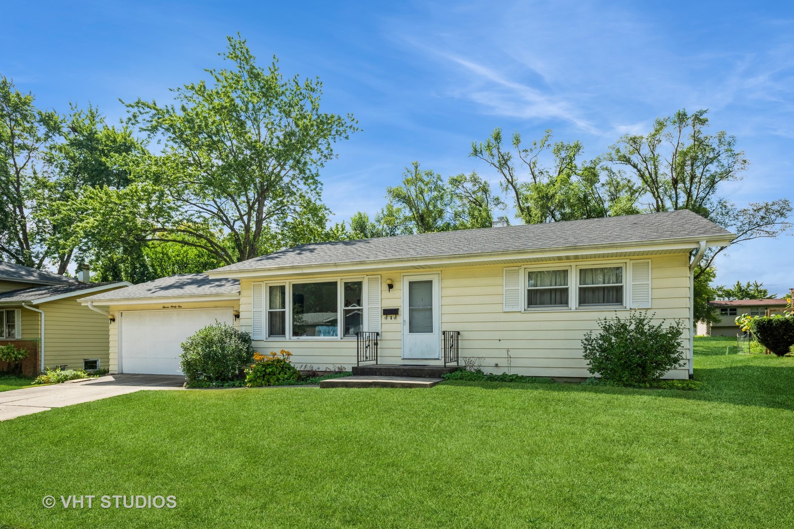 1191 Meadow Lane Elgin, IL 60123 - Photo 2 of 11 a front view of house with yard and green space
