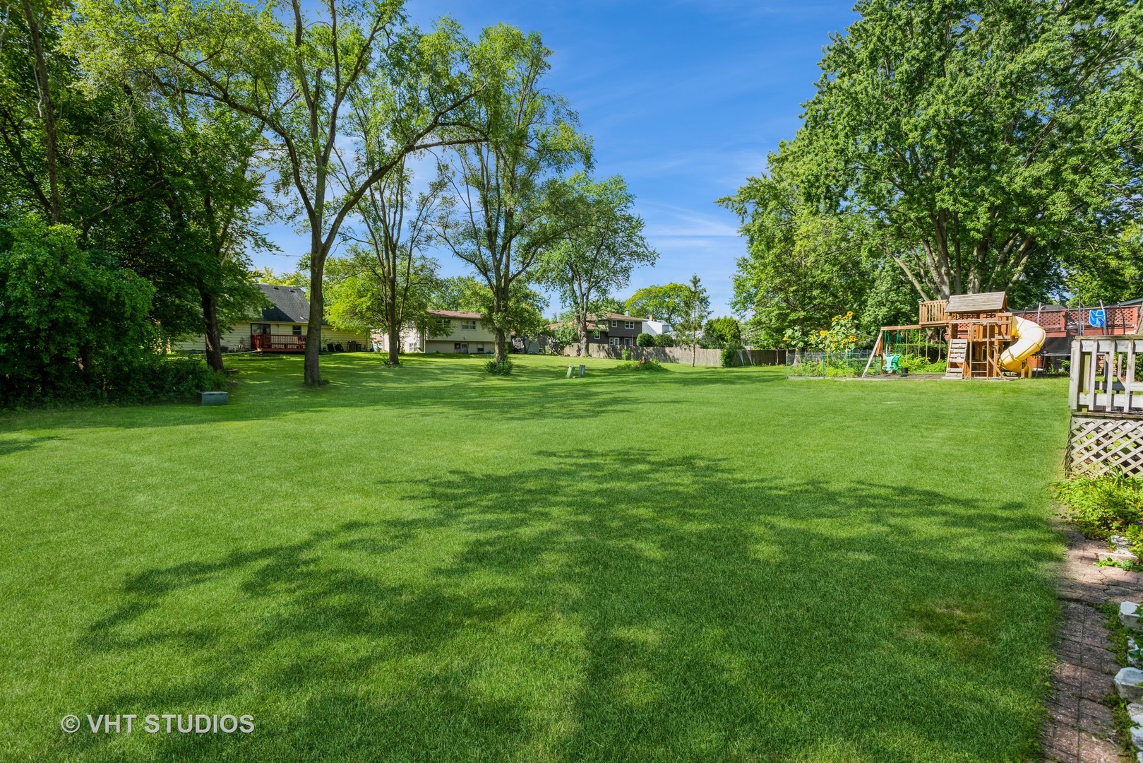 1191 Meadow Lane Elgin, IL 60123 - Photo 6 of 11 a view of a big yard with large trees