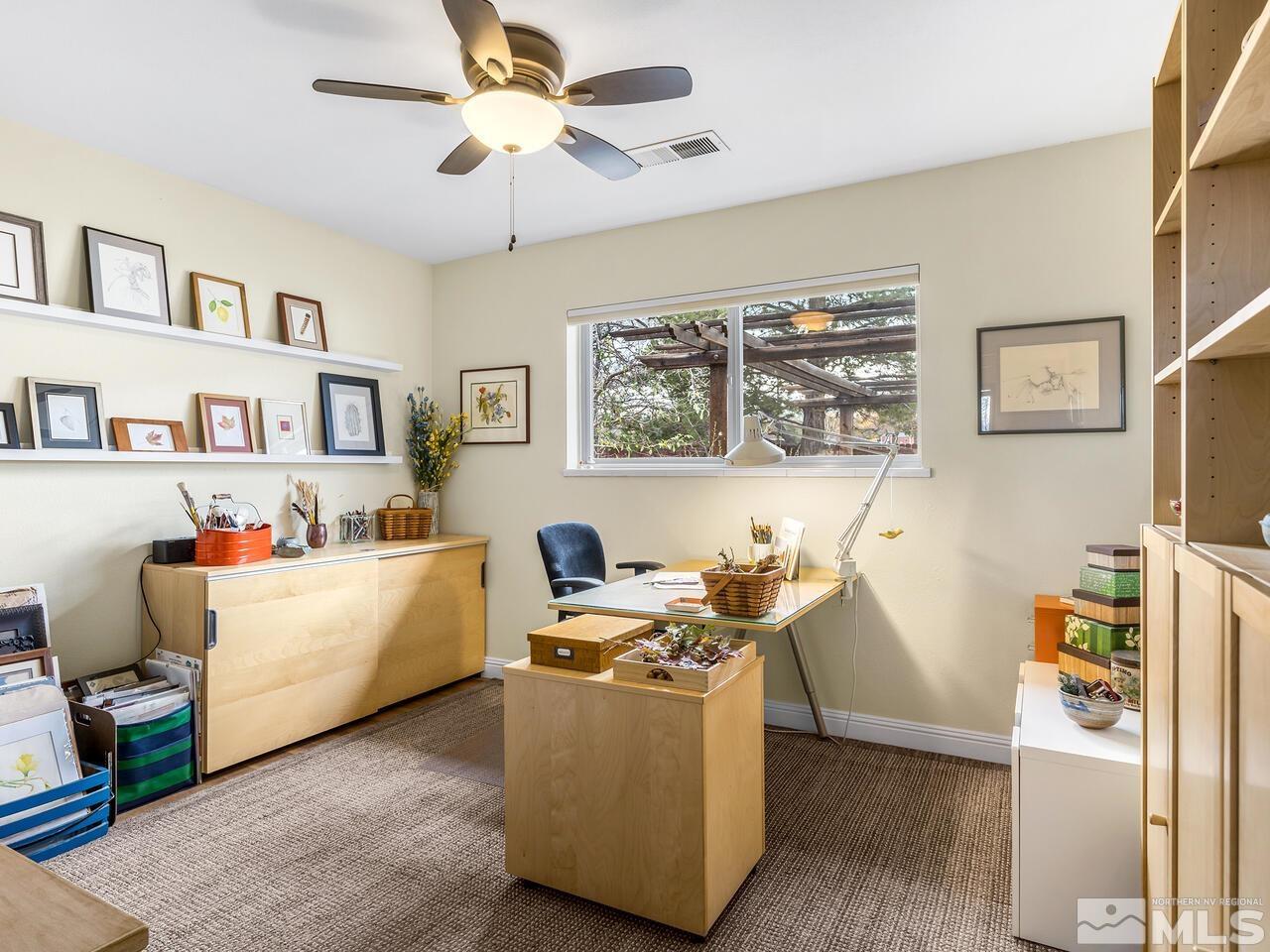 1010 Foothill Road Reno, NV 89511 - Photo 23 of 40 a living room with furniture and a window
