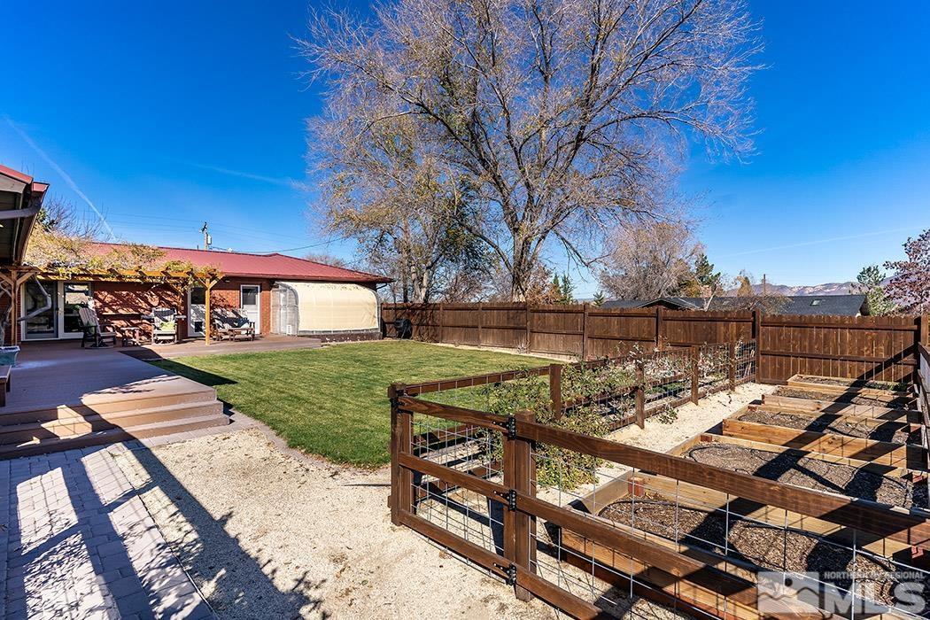 1010 Foothill Road Reno, NV 89511 - Photo 26 of 40 a view of a lake with couches in the patio