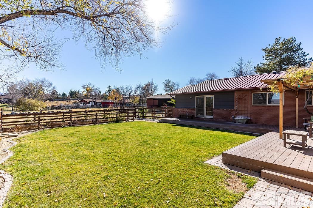 1010 Foothill Road Reno, NV 89511 - Photo 27 of 40 a view of a house with swimming pool and sitting area