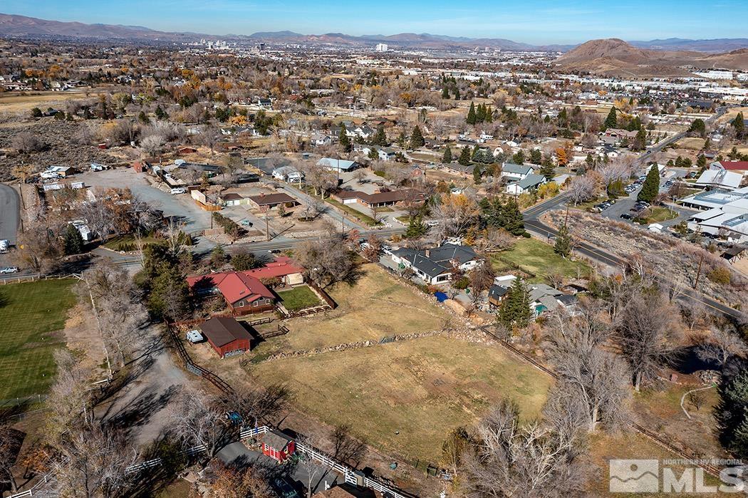 1010 Foothill Road Reno, NV 89511 - Photo 39 of 40 an aerial view of residential houses with city and ocean view