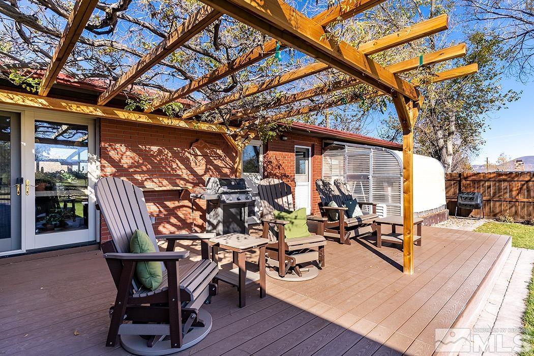 1010 Foothill Road Reno, NV 89511 - Photo 4 of 40 a view of a patio with a table and chairs