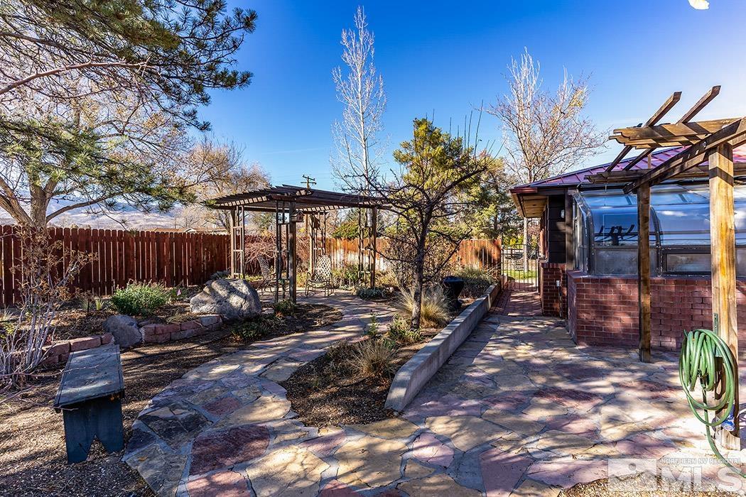 1010 Foothill Road Reno, NV 89511 - Photo 5 of 40 a view of a house with backyard and sitting area