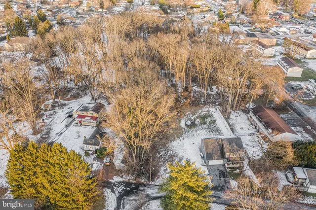 an aerial view of residential house with parking space
