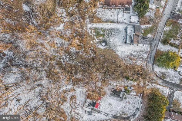 a view of a backyard of the house