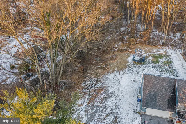an aerial view of a city with lots of residential buildings