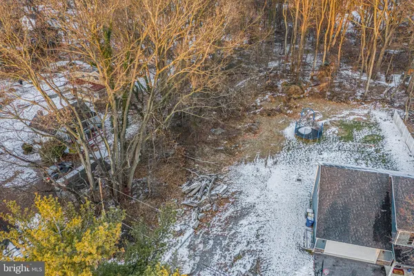 an aerial view of residential building with parking space