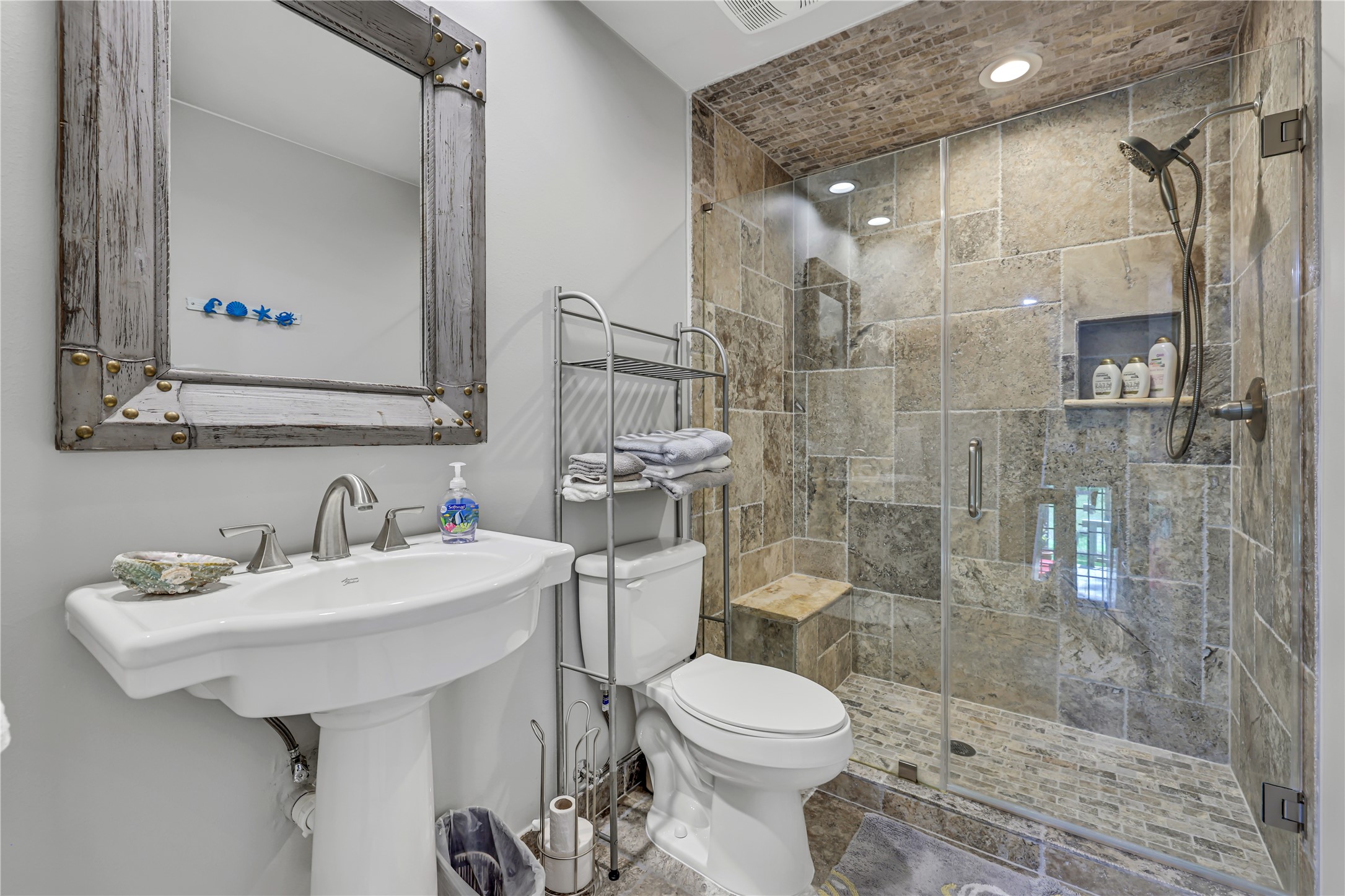 146 Villa Way Coldspring, TX 77331 - Photo 14 of 37 Full bathroom with shower on the kitchen/dining level