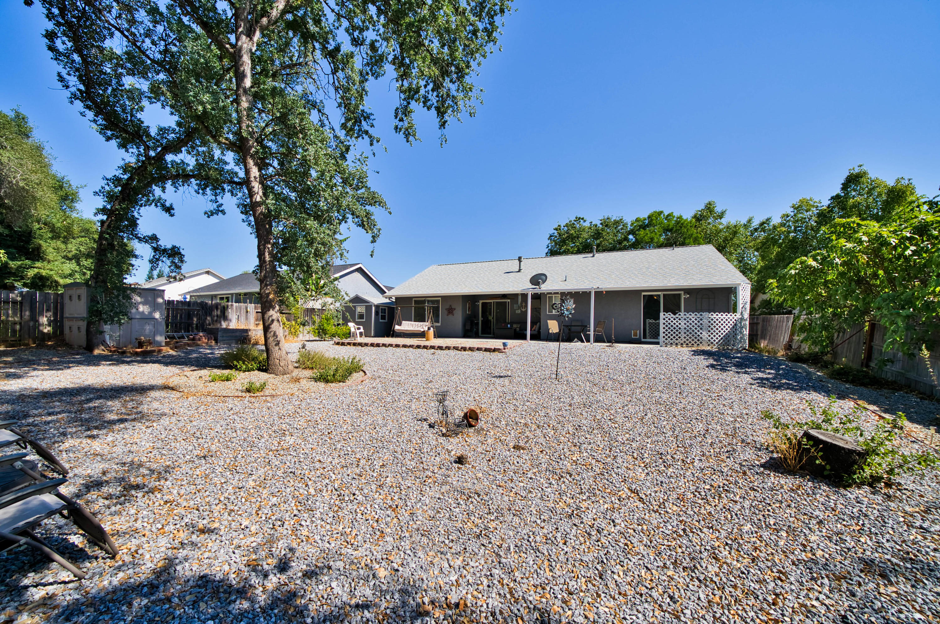 3255 Lawrence Road Redding, CA 96002 - Photo 25 of 27 a front view of a house with a yard