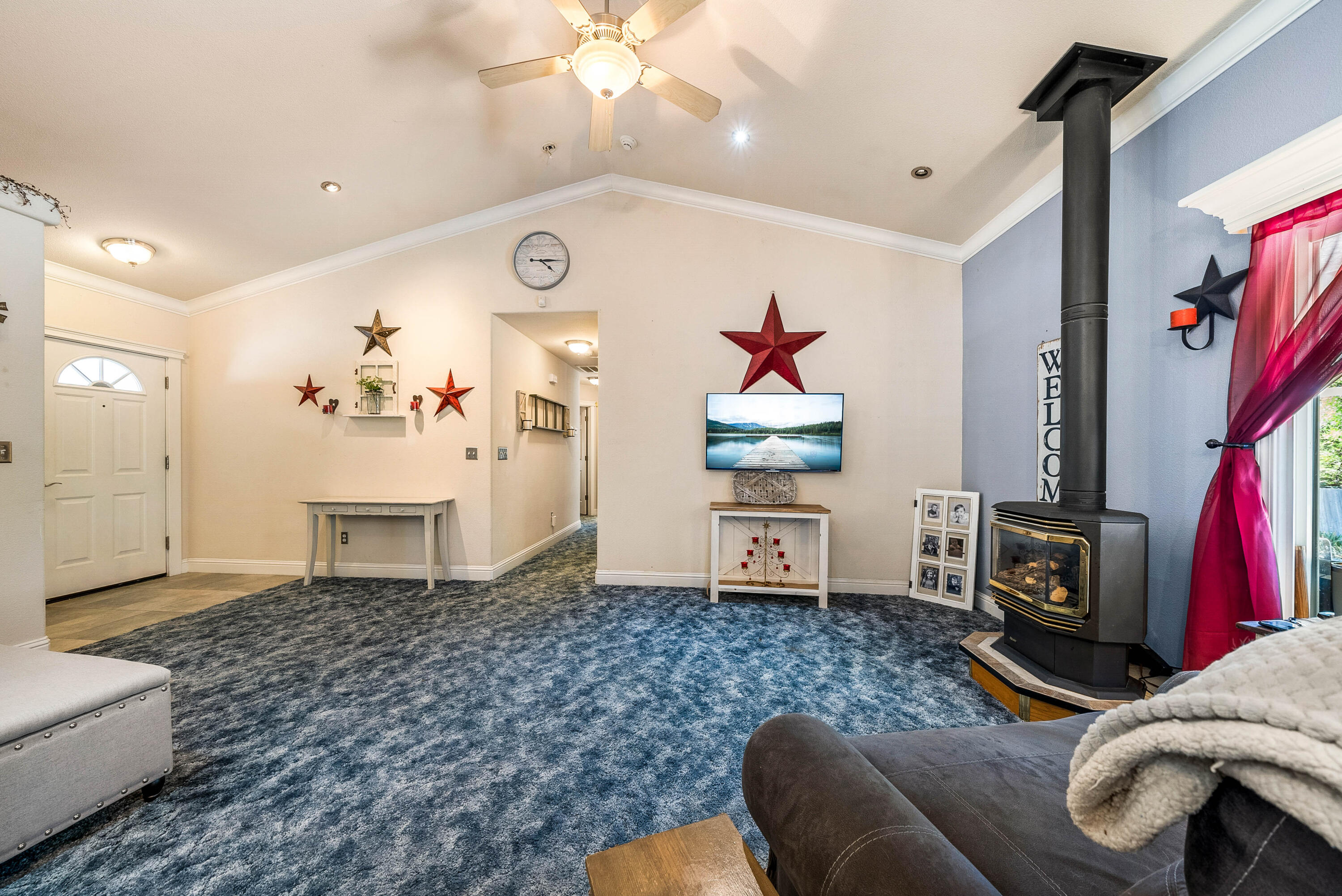 3255 Lawrence Road Redding, CA 96002 - Photo 7 of 27 a living room with furniture and a flat screen tv