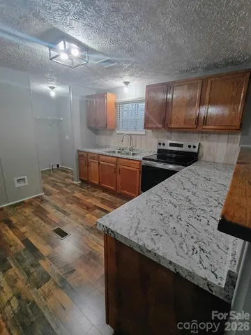 a view of a livingroom with a fireplace