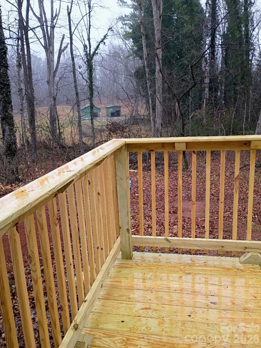 308 Chimney Rock Road Rutherfordton, NC 28139 - Photo 19 of 23 a view of balcony with wooden floor and fence