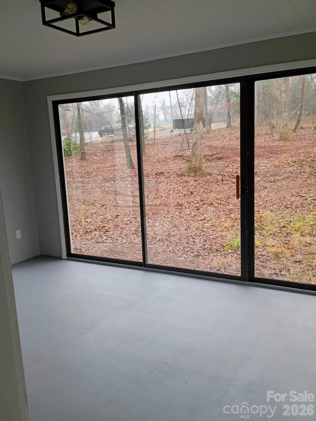 308 Chimney Rock Road Rutherfordton, NC 28139 - Photo 20 of 23 a view of an empty room with a window