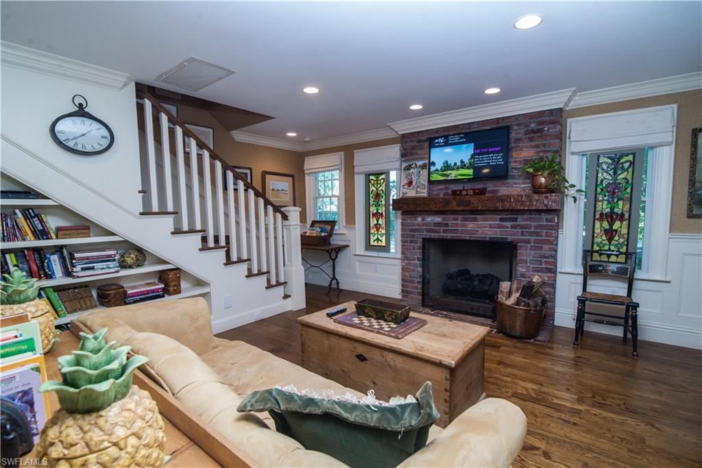 732 Bay Tree Court Naples, FL 34108 - Photo 5 of 21 Gathering Room off Kitchen with Fireplace