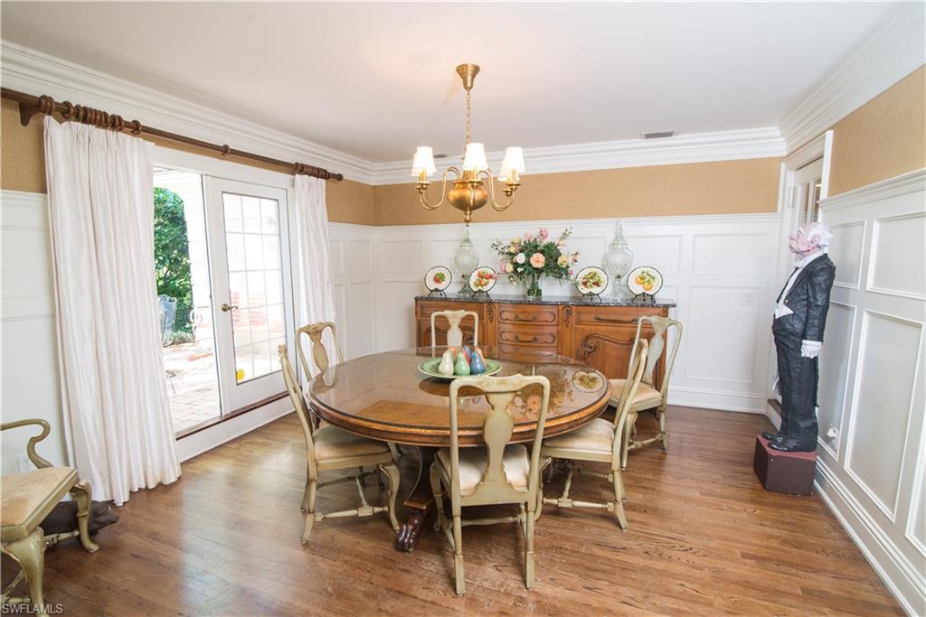 732 Bay Tree Court Naples, FL 34108 - Photo 7 of 21 Dining Room with wood flooring