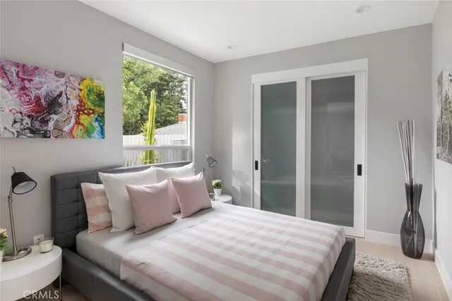 a bathroom with a sink toilet and mirror