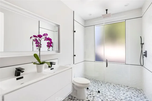 a bathroom with a sink and a shower