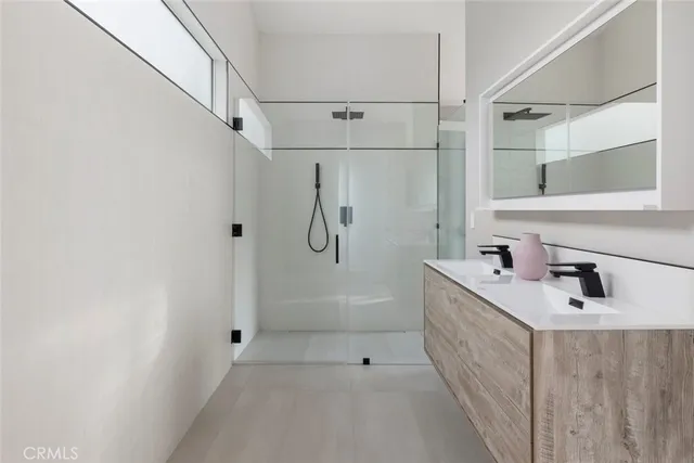 a view of a table and chairs in the garden
