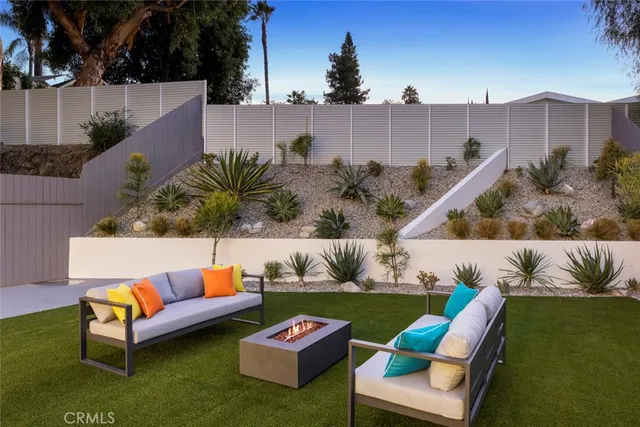 a view of a back yard of the house